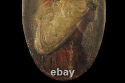 Ancient portrait of a woman, oil painting on panel c. 1900 / Popular art