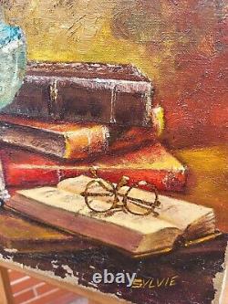 Former Painting Signed Sylvie. Petroleum Lamp And Books Oil Painting On Canvas