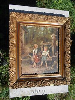 Large ancient oil painting / canvas of children by a well fountain signed Doria in a golden frame