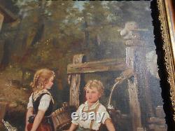 Large ancient oil painting / canvas of children by a well fountain signed Doria in a golden frame