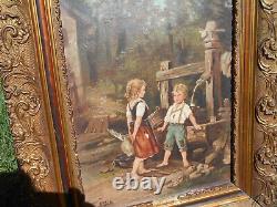 Large ancient oil painting / canvas of children by a well fountain signed Doria in a golden frame