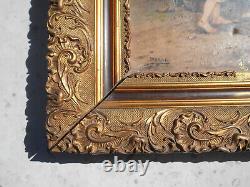 Large ancient oil painting / canvas of children by a well fountain signed Doria in a golden frame