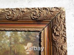 Large ancient oil painting / canvas of children by a well fountain signed Doria in a golden frame