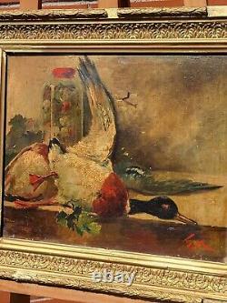 Old Tableau signed Still Life with Game. Oil painting on canvas.