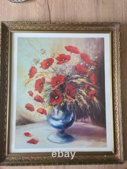 Old carved wooden frame with a reproduction of an oil on canvas signed