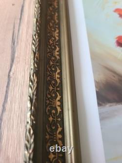 Old carved wooden frame with a reproduction of an oil on canvas signed
