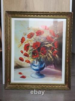 Old carved wooden frame with a reproduction of an oil on canvas signed