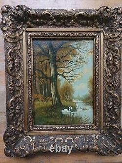 Old late 19th century landscape painting with swans