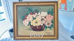 Old oil on canvas floral bouquet signed E. V. Ribière 44 × 37 cm
