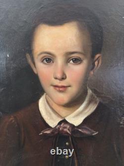 Old oil on canvas portrait of a child, French School, circa 1850, 46 x 38