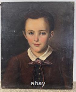 Old oil on canvas portrait of a child, French School, circa 1850, 46 x 38