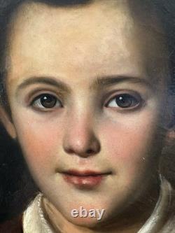 Old oil on canvas portrait of a child, French School, circa 1850, 46 x 38