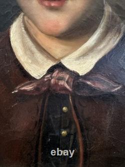 Old oil on canvas portrait of a child, French School, circa 1850, 46 x 38