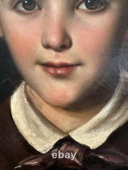 Old oil on canvas portrait of a child, French School, circa 1850, 46 x 38
