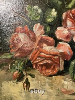 Old oil on canvas signed A. Daens bouquet of roses laid out on a table