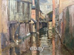 Old oil on panel signed and titled 'Old Annecy' label on the back