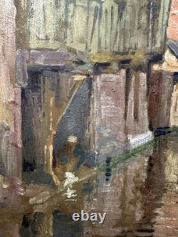 Old oil on panel signed and titled 'Old Annecy' label on the back