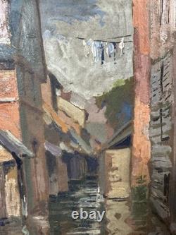 Old oil on panel signed and titled 'Old Annecy' label on the back