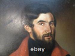 Old oil painting on canvas from the 19th century: portrait of an elegant man with a beard