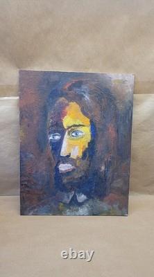 Old oil painting on canvas mounted on cardboard, portrait of a man's face, 27 cm x 35 cm