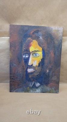 Old oil painting on canvas mounted on cardboard, portrait of a man's face, 27 cm x 35 cm