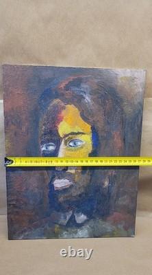 Old oil painting on canvas mounted on cardboard, portrait of a man's face, 27 cm x 35 cm