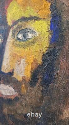 Old oil painting on canvas mounted on cardboard, portrait of a man's face, 27 cm x 35 cm