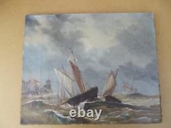 Old oil painting on canvas of a seascape with boats on a stormy coast, 19th century.
