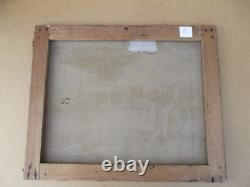 Old oil painting on canvas of a seascape with boats on a stormy coast, 19th century.