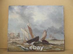 Old oil painting on canvas of a seascape with boats on a stormy coast, 19th century.