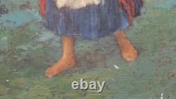 Old oil painting on canvas of a water carrier with the red shawl, Portugal