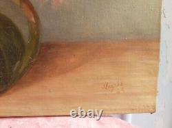 Old oil painting on canvas with chrysanthemums in a green pitcher signed and dated
