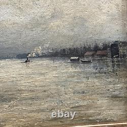 Old oil painting on wood of the Seine before Paris, snowy landscape with a boat