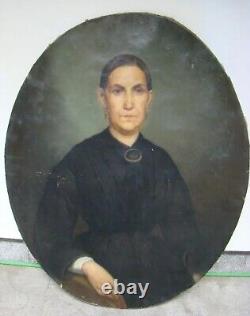 Old painting Oil on canvas. Portrait of a woman. 19th century