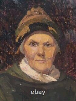 Old painting. Portrait of a woman. Oil painting on canvas.