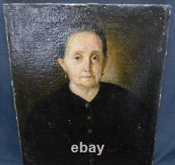 Old painting on canvas Portrait of a woman. 19th century