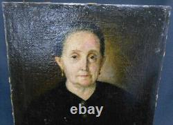 Old painting on canvas Portrait of a woman. 19th century