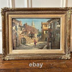 Old painting on panel with a village decoration