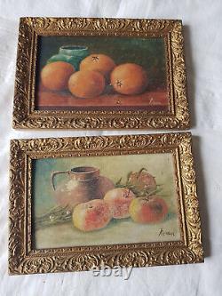 Pair of old still life oil paintings on panel signed Reboul