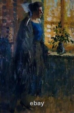 Translation: 'Old painting, Breton woman in an interior, Oil on cardboard, Early 20th century painting'