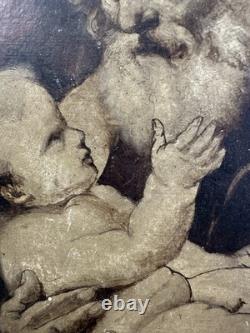 Ancienne huile sur carton fort début XIXe vue d'un Saint avec l'enfant Jésus