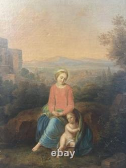 Ancienne huile sur toile Vierge et l'enfant Jésus probable rentoilage ancien