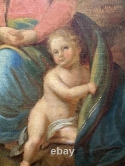 Ancienne huile sur toile Vierge et l'enfant Jésus probable rentoilage ancien