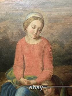 Ancienne huile sur toile Vierge et l'enfant Jésus probable rentoilage ancien