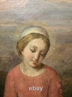 Ancienne huile sur toile Vierge et l'enfant Jésus probable rentoilage ancien