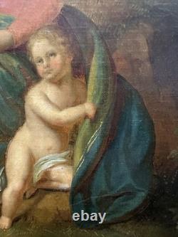 Ancienne huile sur toile Vierge et l'enfant Jésus probable rentoilage ancien