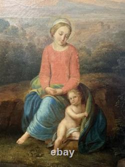 Ancienne huile sur toile Vierge et l'enfant Jésus probable rentoilage ancien