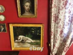 Ancienne huile sur toile du XXe siècle représentant un nu féminin, cadre doré