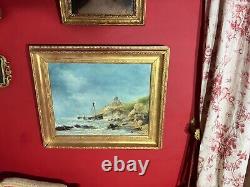 Ancienne huile sur toile signée représentant une marine animée, cadre doré