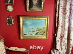 Ancienne huile sur toile signée représentant une marine animée, cadre doré